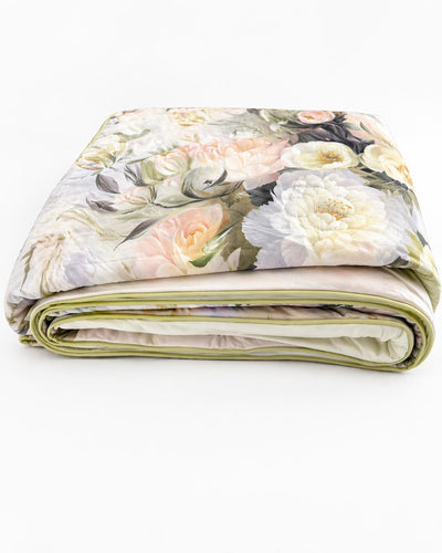 Floral patterned blanket on a white background